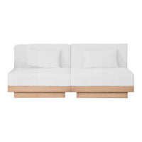 Modern white sofa with sleek wooden base, featuring clean lines and minimalist design for contemporary interiors.