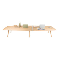 Natural wood desk in light beige with smooth lines and minimalistic design, featuring subtle pastel accents.