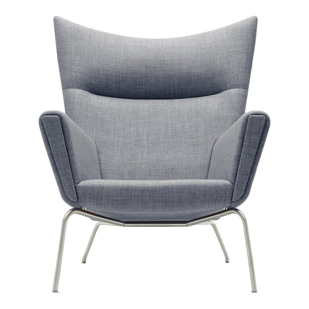 Gray upholstered armchair with a smooth texture and sleek modern design, featuring a high back and minimalist metal legs.