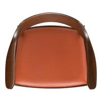 Brown wooden chair with a smooth, orange leather seat and curved armrests. Stylish and modern design.