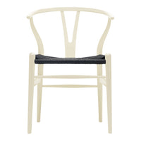 Beige chair with a minimalist design and a dark gray seat cushion, featuring clean lines and a modern aesthetic.