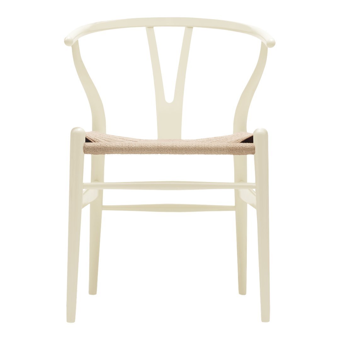Cream-colored chair with a woven beige seat and minimalist design, featuring curved backrest and clean lines.