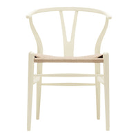Cream-colored chair with a woven beige seat and minimalist design, featuring curved backrest and clean lines.