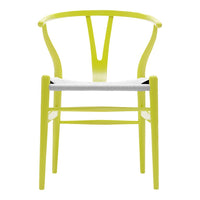 Bright yellow chair with a minimalist design and contrasting white seat. Ideal for modern decor.