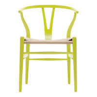 Lime green wooden chair with a natural woven seat and smooth, curved design. Ideal for modern decor.