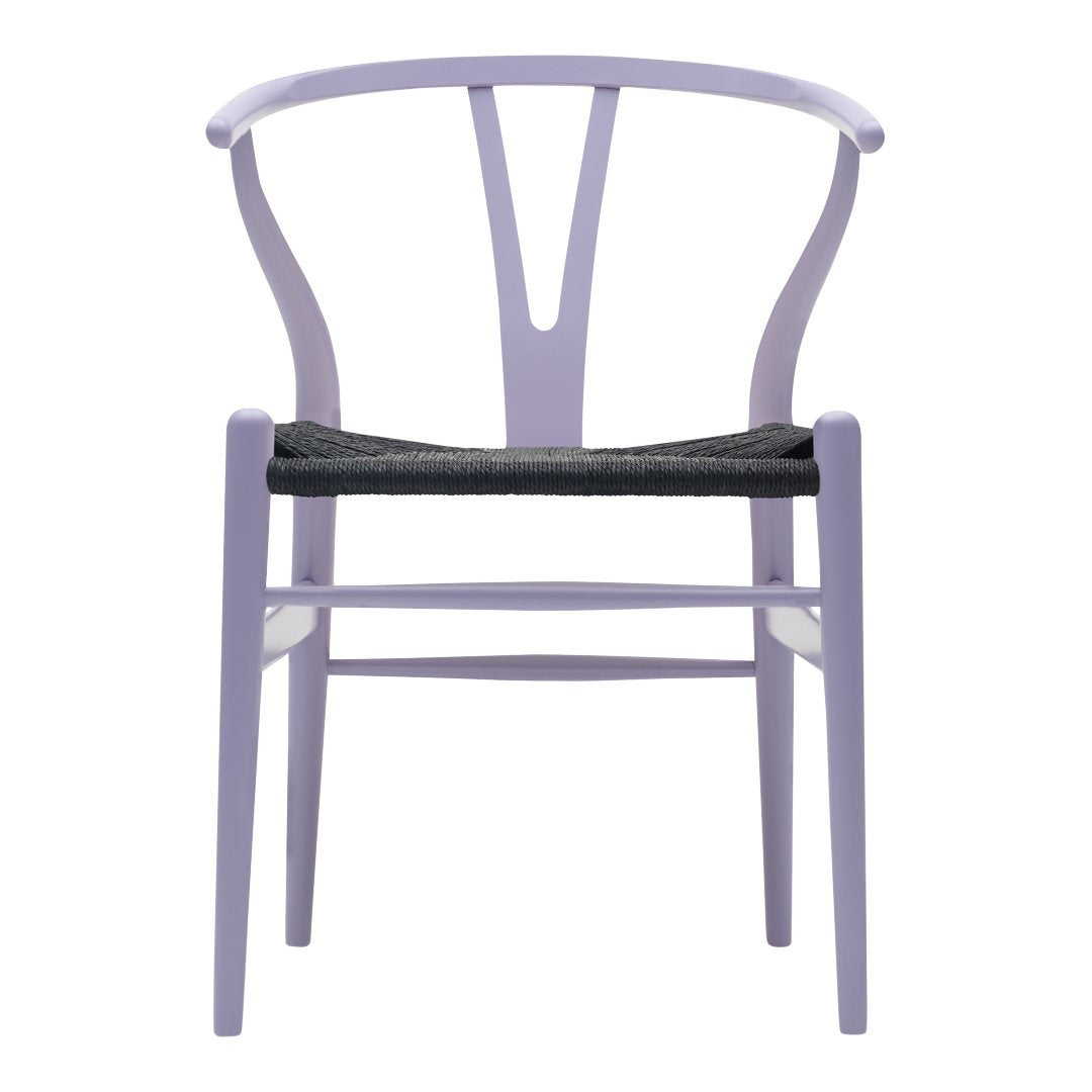 Lavender wood chair with a black woven seat and minimalist design. Stylish and modern home decor accent.