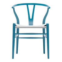 Teal wooden chair with a minimalist design, featuring a woven white seat and smooth, curved backrest.