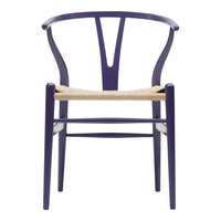Purple wood chair with a natural woven seat, featuring a modern, minimalist design and elegant lines.