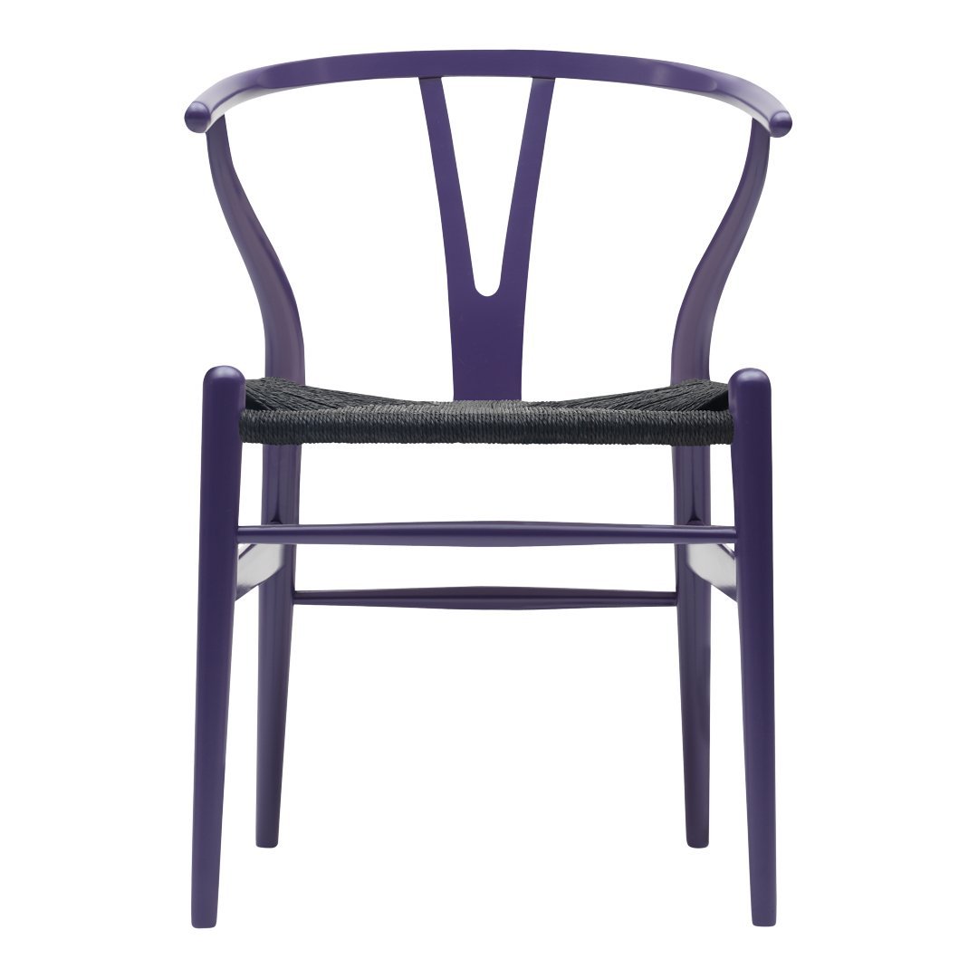 Purple chair with distinctive Y-shaped back and black woven seat. Modern design with vibrant color contrast.
