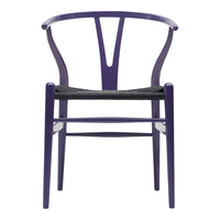Purple chair with distinctive Y-shaped back and black woven seat. Modern design with vibrant color contrast.