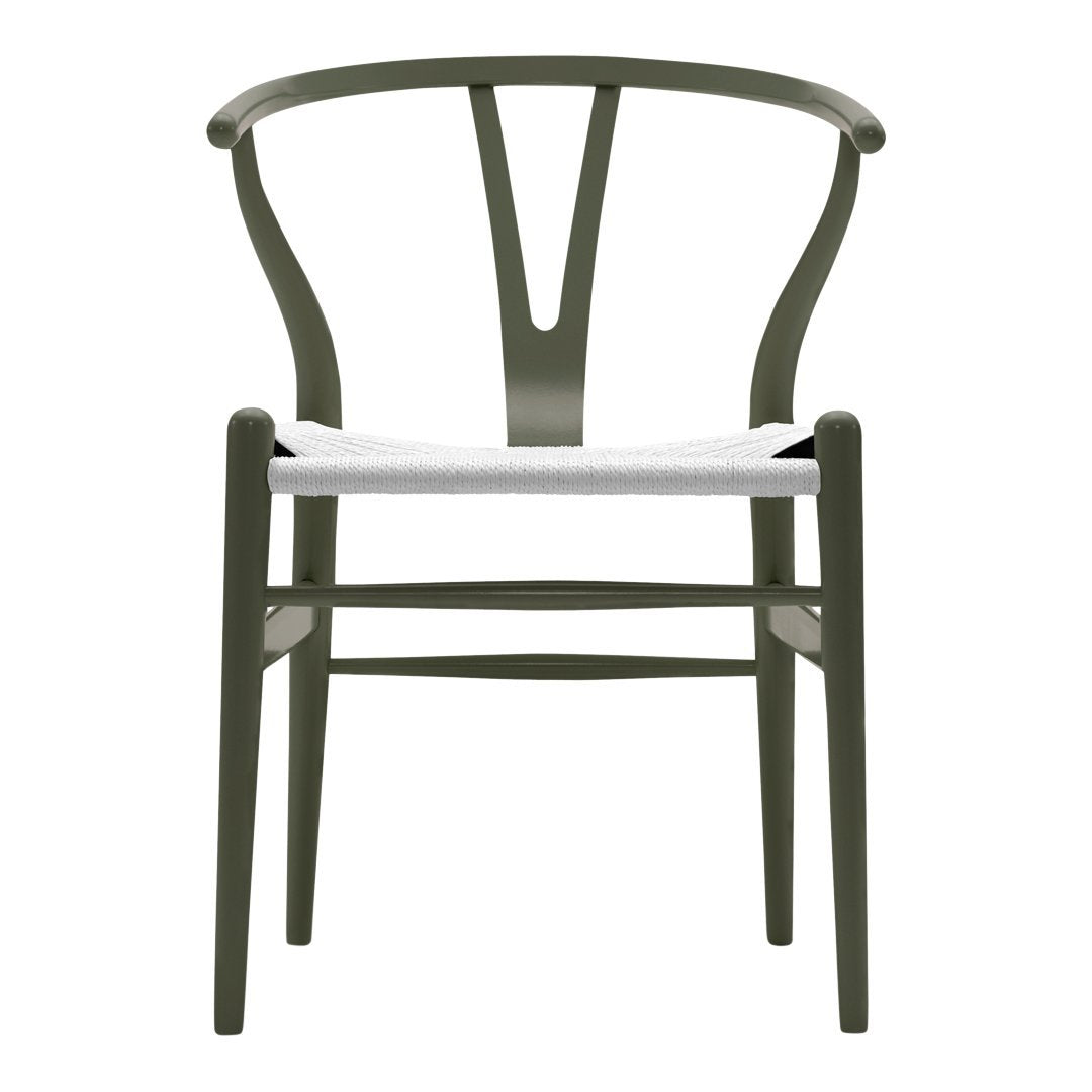 Olive green wooden chair with a white seat, featuring a minimalist design and elegant curved lines.