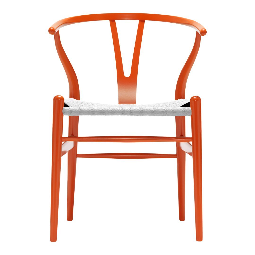 Orange wooden chair with a minimalist design and a white seat cushion, showcasing smooth curves and modern aesthetics.