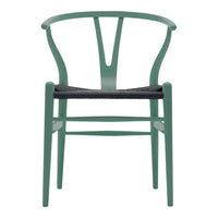 Mint green wooden chair with a woven black seat, featuring a unique, modern curved design.