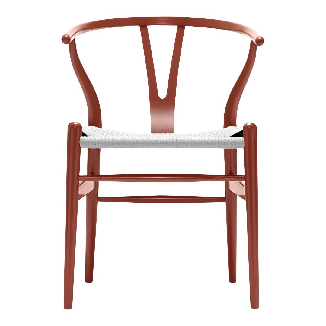 Rust-colored wooden chair with a sleek, minimalistic design and a white woven seat. Perfect for modern interiors.
