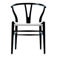 Black wooden chair with a minimalist design and a white woven seat. Elegant lines and smooth finish enhance its modern style.