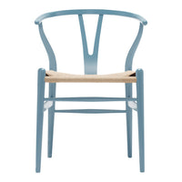 Light blue wooden chair with minimalist design and natural woven seat, ideal for modern decor.