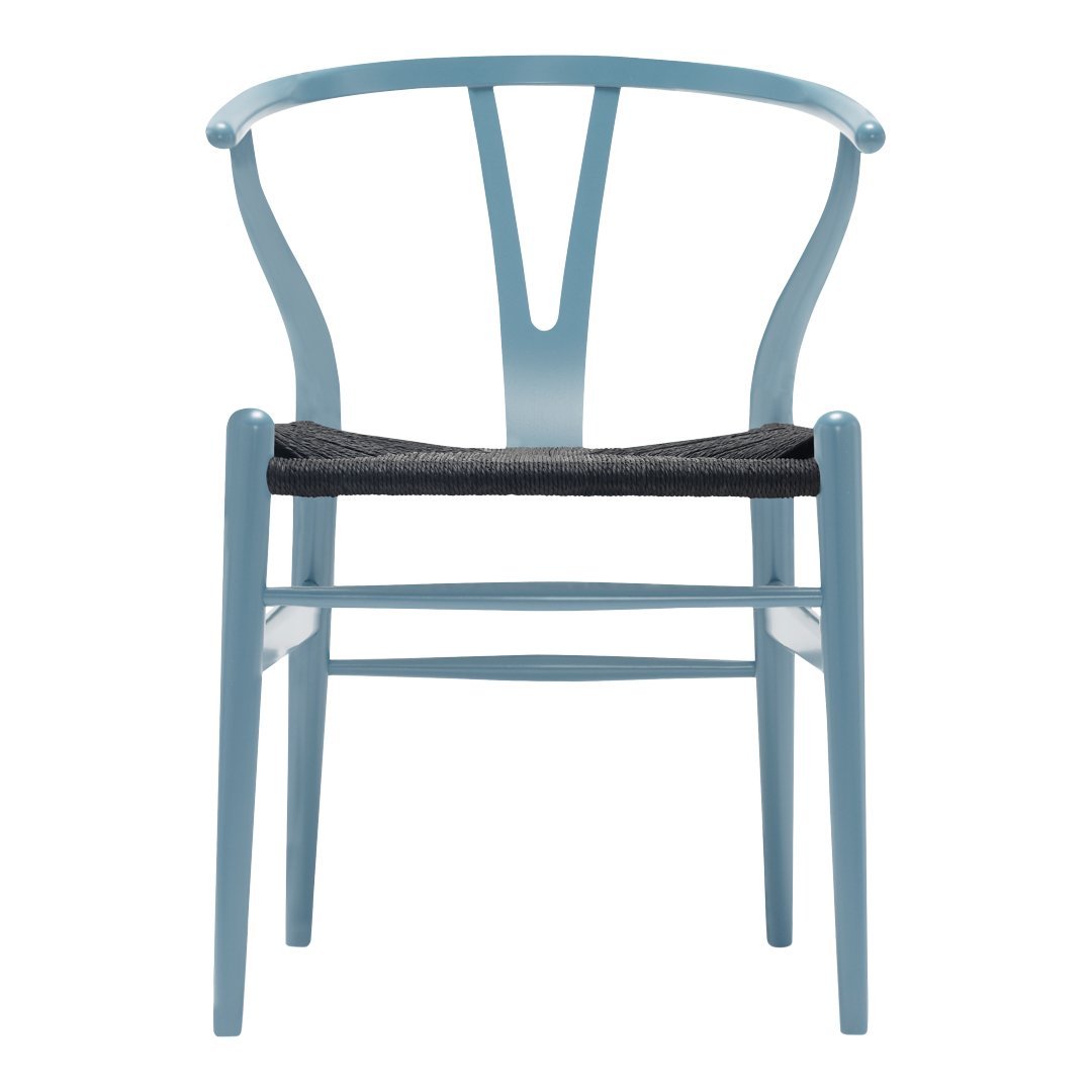 Light blue chair with a minimalist design and a textured black seat, showcasing modern elegance and style.