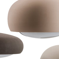 Three stylish ceiling lights in soft brown and taupe shades with smooth, rounded designs.