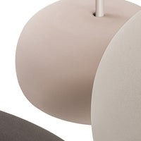 Muted beige and taupe round shapes with a smooth, modern finish against a dark gray background.