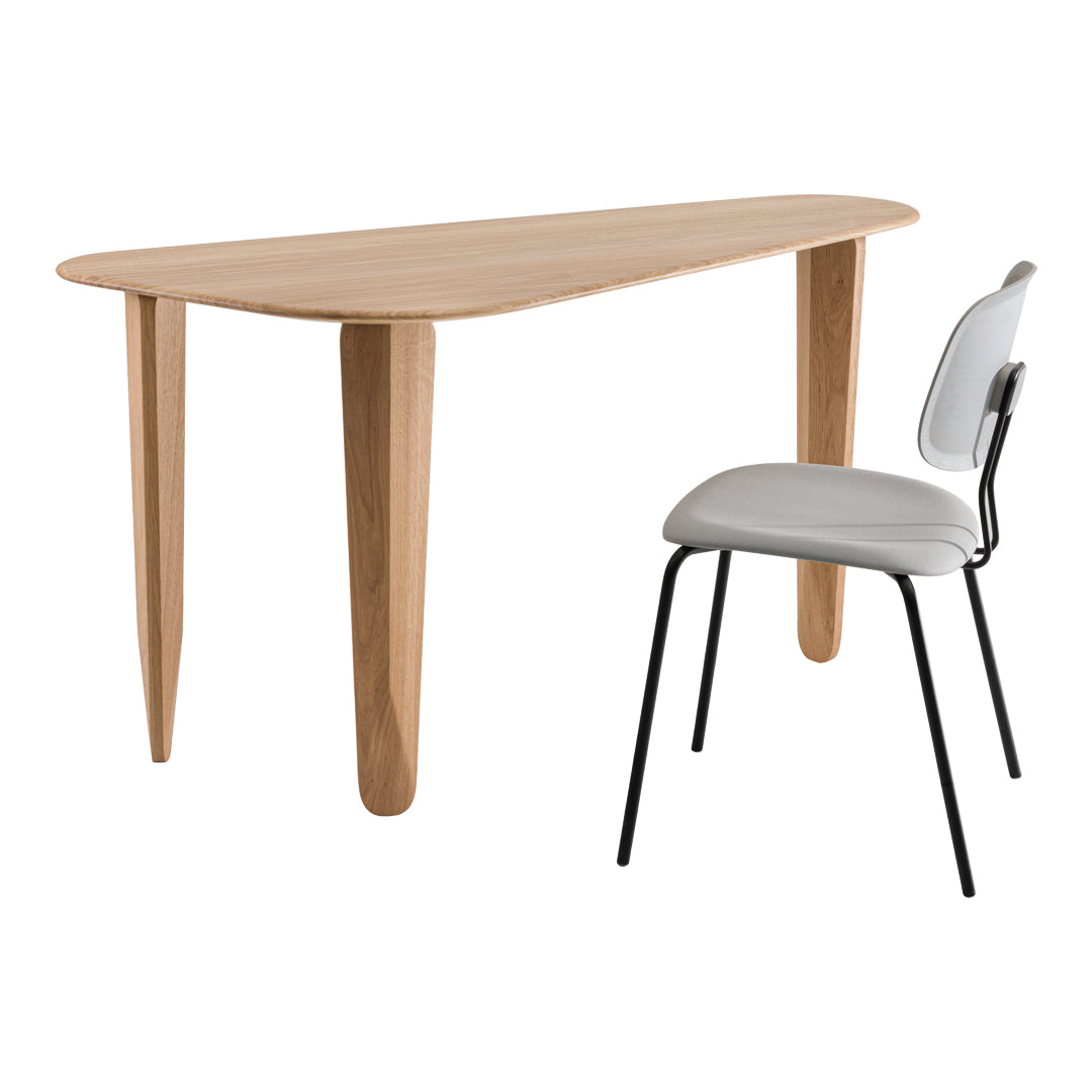 Light wood table with a natural finish and a sleek white and black chair, featuring a minimalist design.