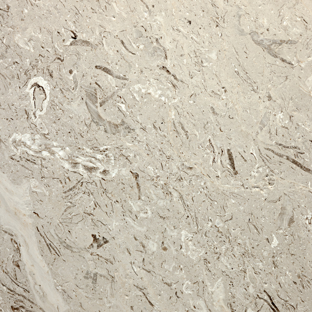 Light beige surface with subtle white and gray marbling patterns, adding a natural, textured touch.
