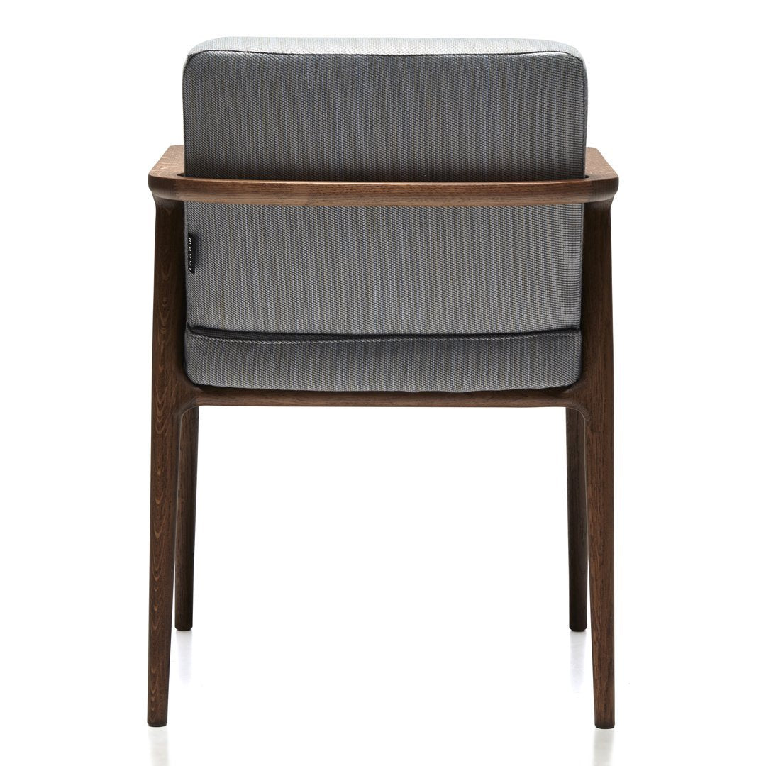 Back view of a modern chair featuring a gray textured cushion and a warm wood frame. Elegant and stylish design.