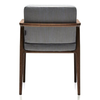Back view of a modern chair featuring a gray textured cushion and a warm wood frame. Elegant and stylish design.