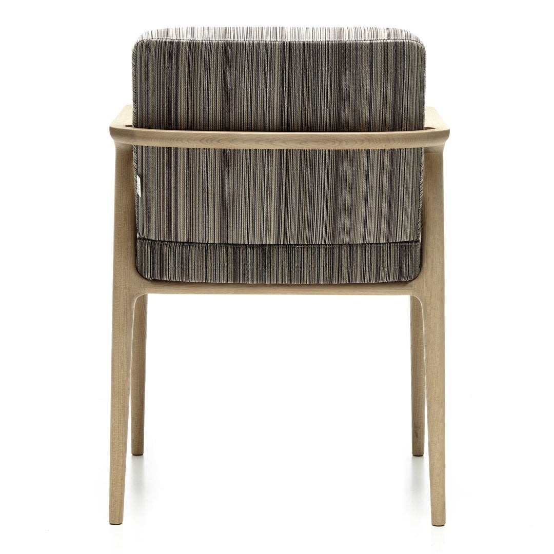 Striped gray and taupe upholstery on a light wood chair, featuring a modern and stylish design.