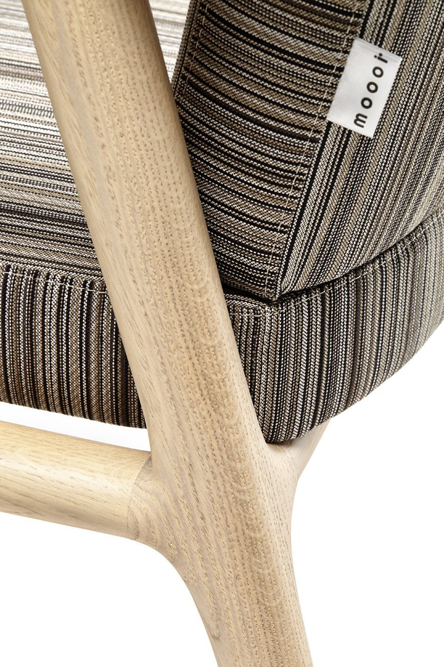 Striped gray and beige upholstery with a natural wood frame, showcasing a modern texture and pattern design.
