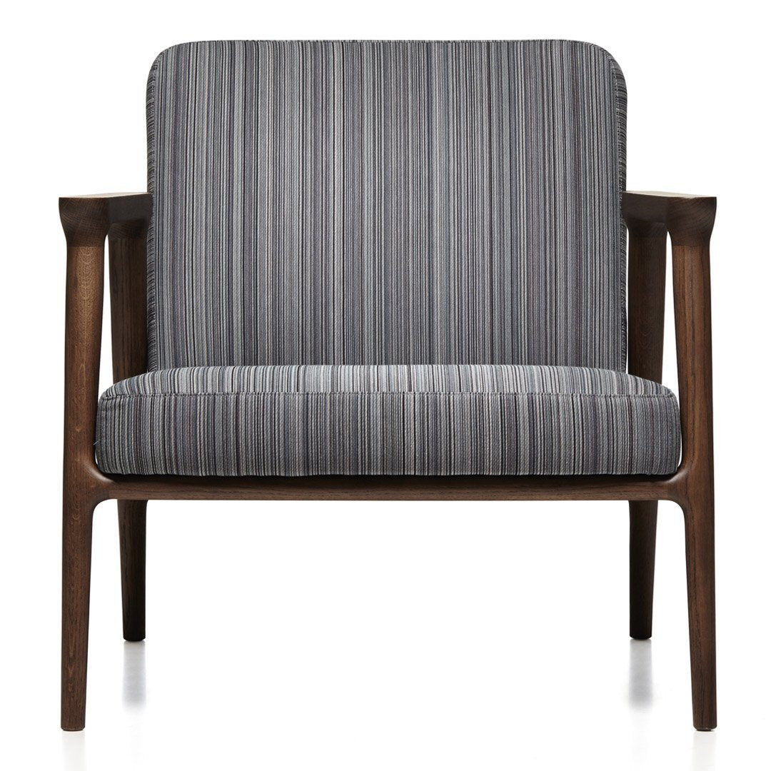 Gray striped fabric armchair with a wooden frame. Modern design with vertical patterns for a stylish touch.